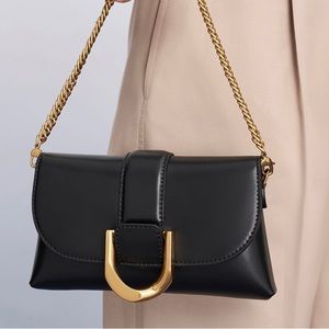 Charles and Keith: 
Gabine Crossbody Bag - Black
